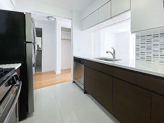 5th image of 310 E 2nd St APT 4J