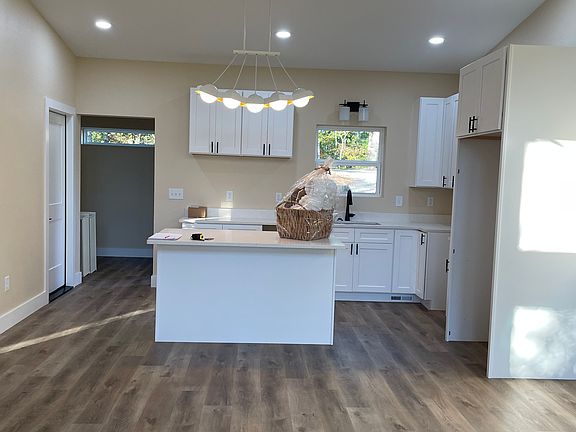 Kitchen and great room. LG appliances, built in lighting, private well water furnished.