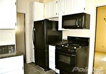 Kitchen with black on black appliances