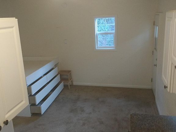 Living area with built in bed