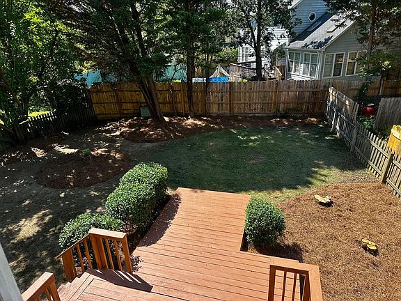 Spacious and peaceful fenced in yard.