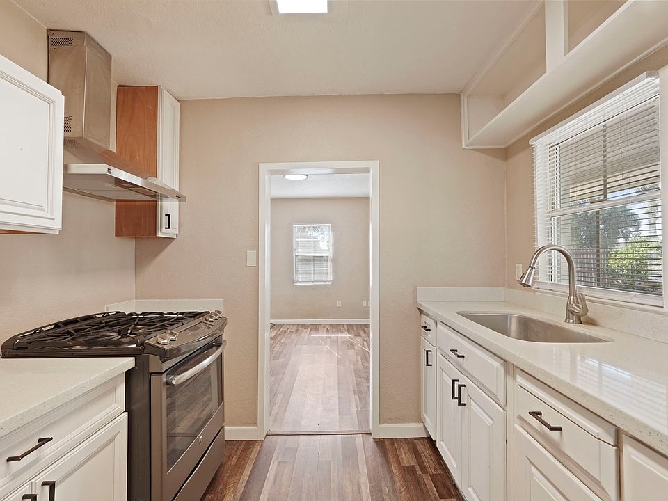 Kitchen looking into living room