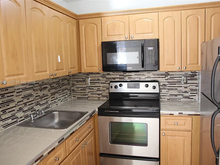 8075 NW 7th St #115 — Photo 15