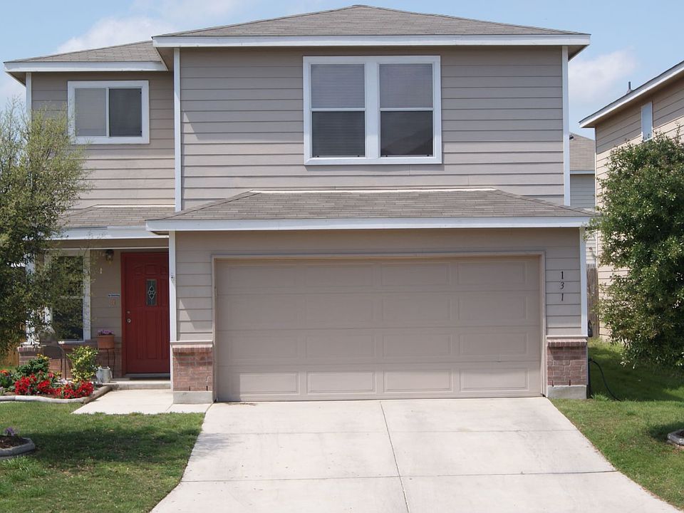 Front exterior with 2 car garage and door opener