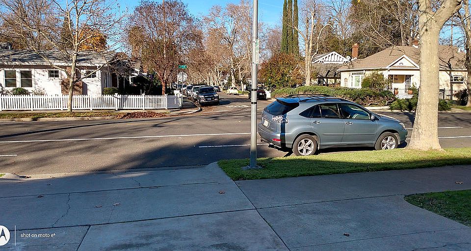 View of the street scene in front of the house from the driveway north.
