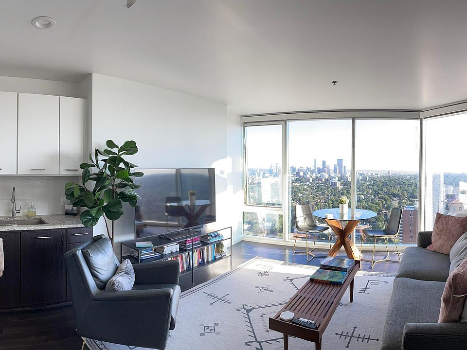 In-Home Features: -10 ft. ceilings -In-unit front-load washer and dryer -Mountain and city views -Stainless steel appliances -Granite countertops -Floor to ceiling windows