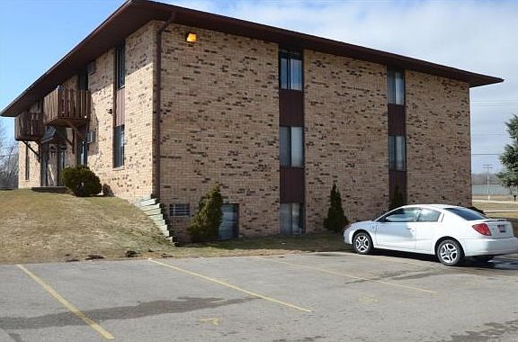 Three Story Brick/ Metal Roof
