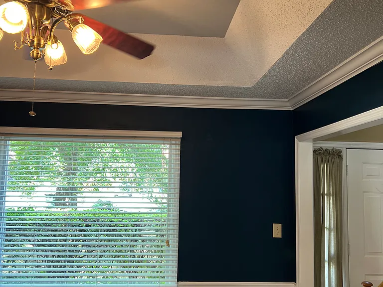 Formal dining from kitchen side to entryway