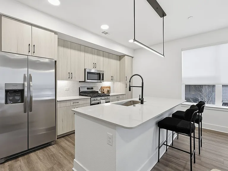 Functional and stylish kitchen with modern cabinetry and natural light