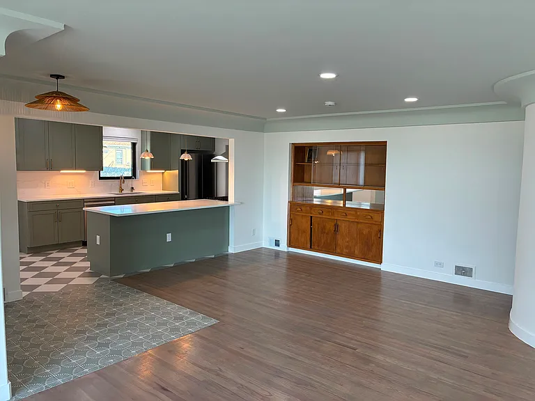 Living area and kitchen peninsula