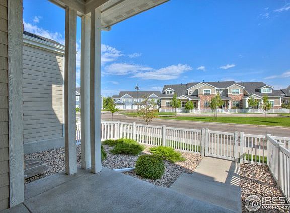 Covered Front Patio Area w/private Fenced Yard