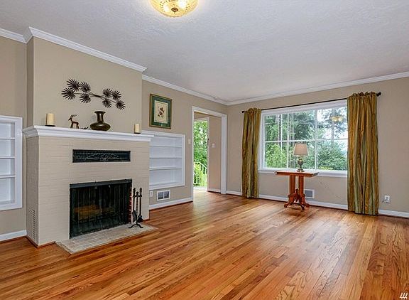 Living room with beautifully refinished hardwood floors.