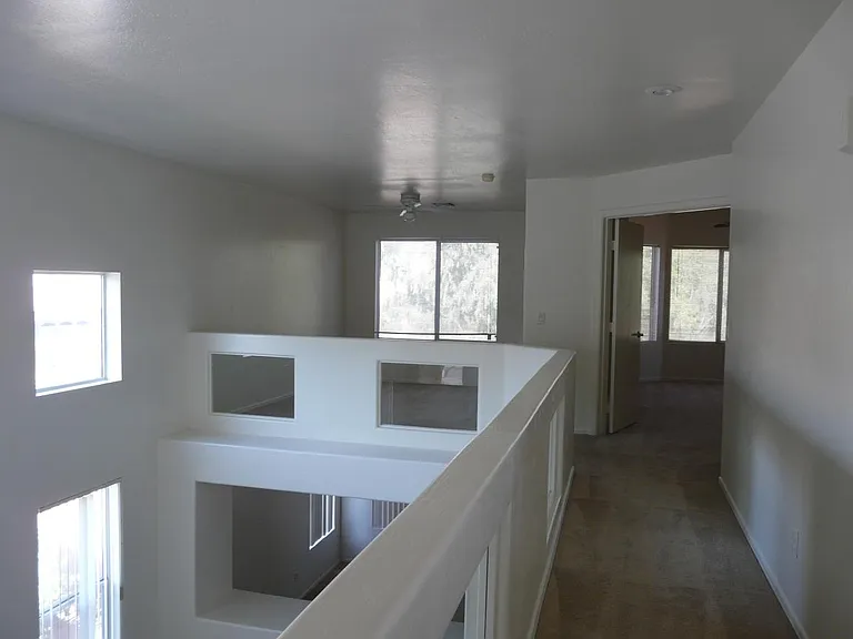 upstairs: view on open loft area and entrance to the master bedroom and Master bathroom