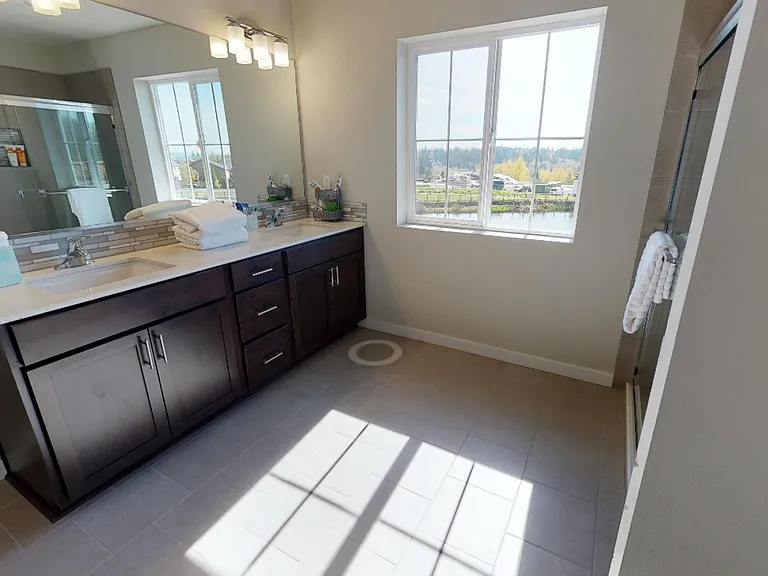 Attached Master bathroom with walk in closet