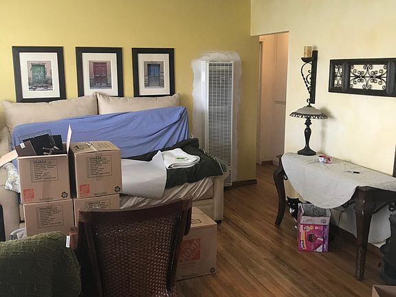 Large main room with hardwood floors