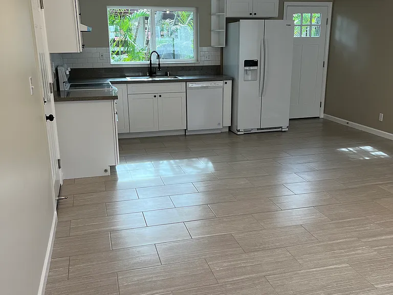 Kitchen back door opens to back yard