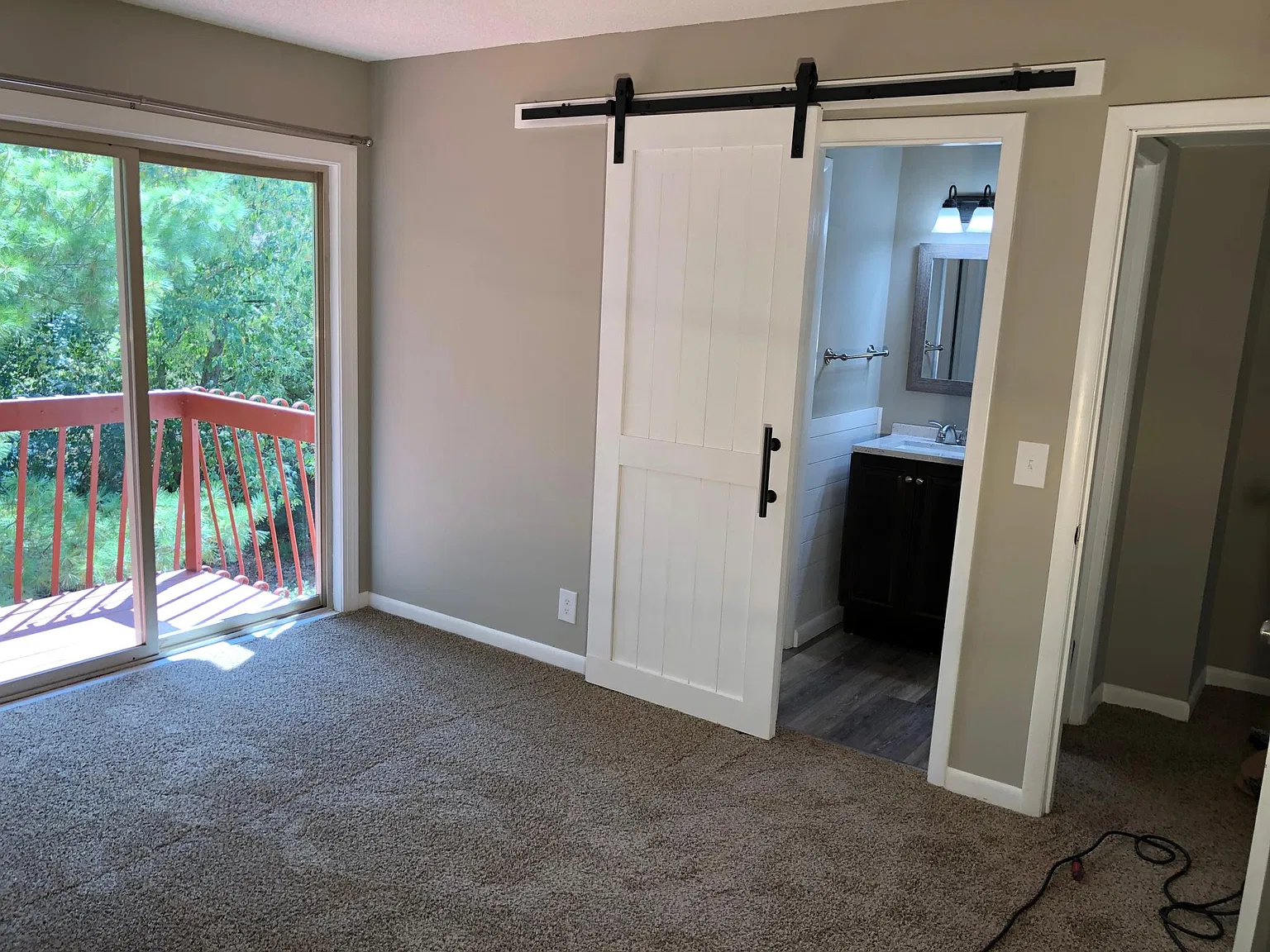 Master suite with bath and balcony