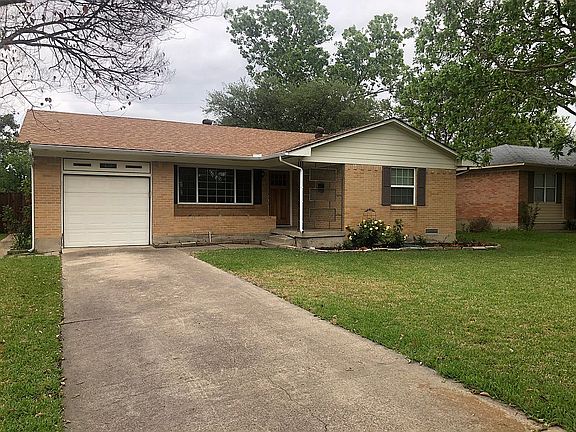 Front with side yard access.