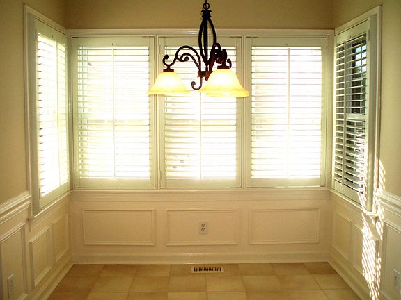 Breakfast nook/Custom wainscoting & Plantation shutters