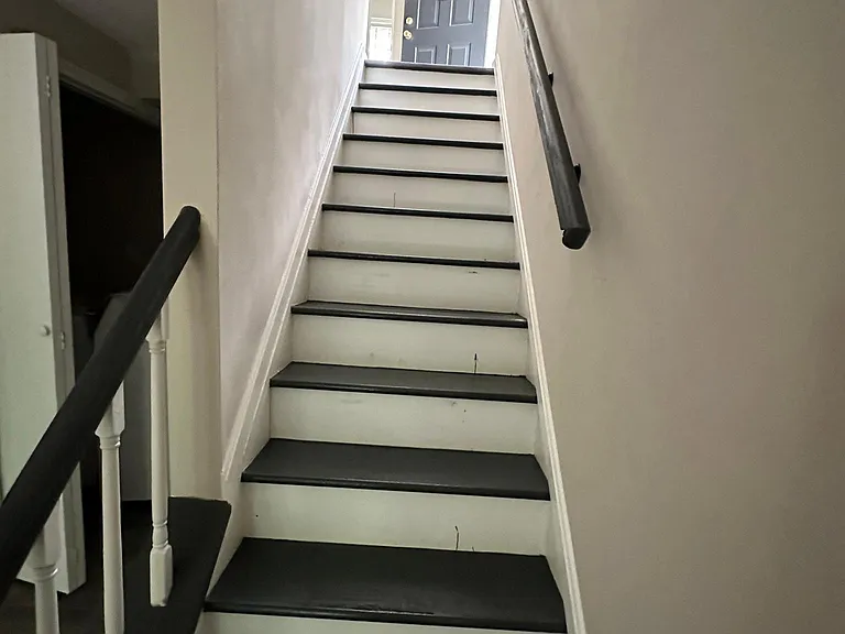 Stairs from basement to first floor