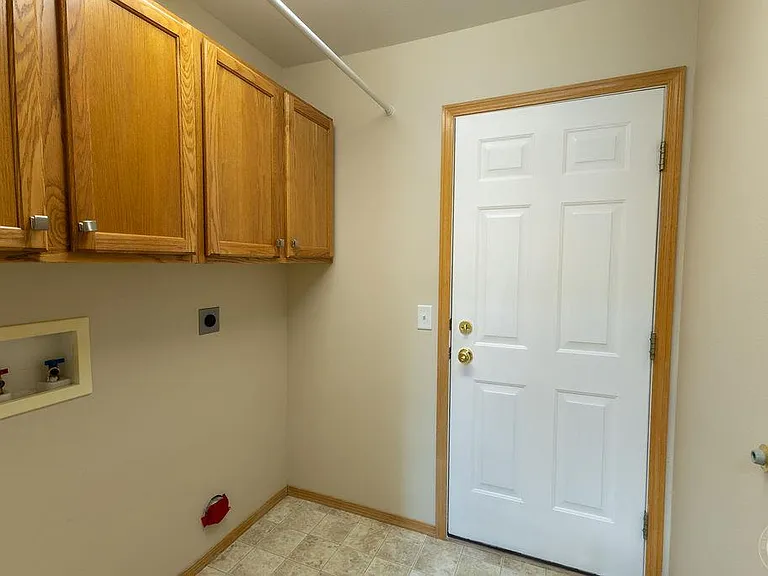 Main floor Laundry room, door to the garage