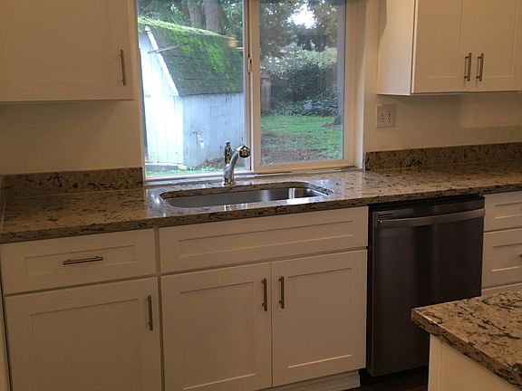 Shed outside kitchen has been painted and a new roof since this photo