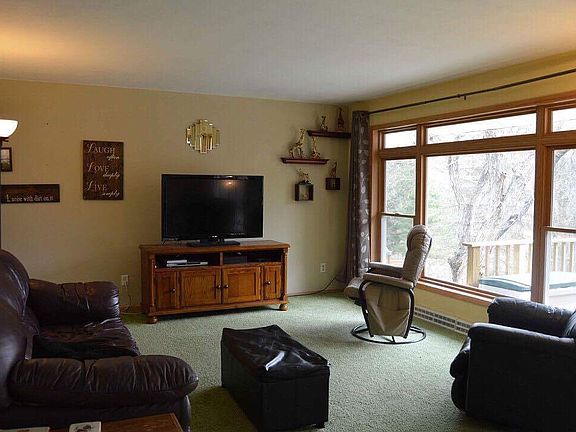 Living room with wooded view