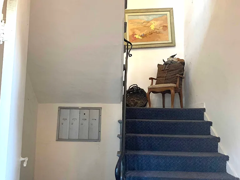 view through entry door, your apartment is to the right. stairs lead to upstairs apartments