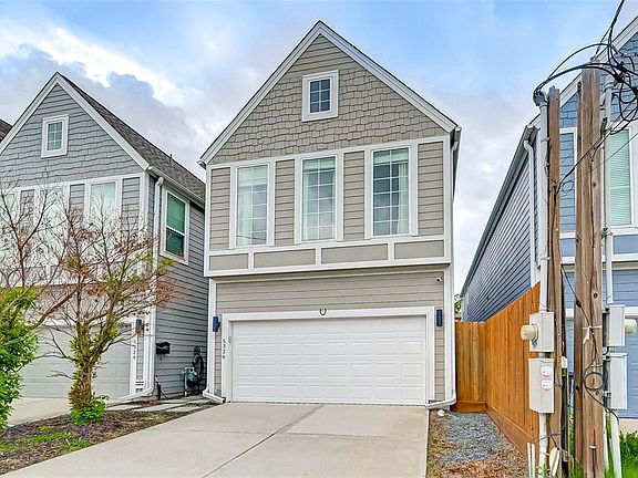 A private driveway leading into a spacious 2-car garage.