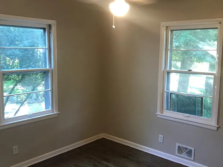 3rd bedroom with new dark hardwoods!