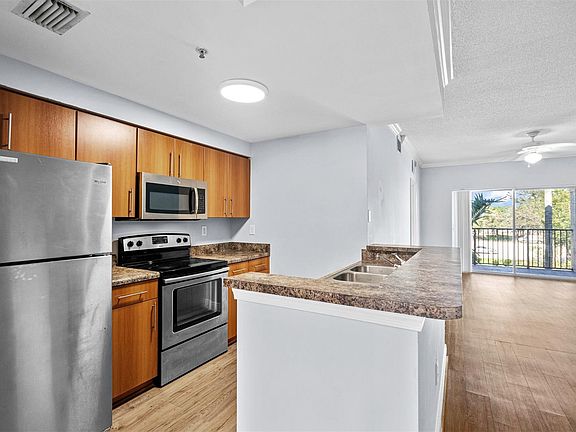 2nd image of 5880 W Sample Road #307