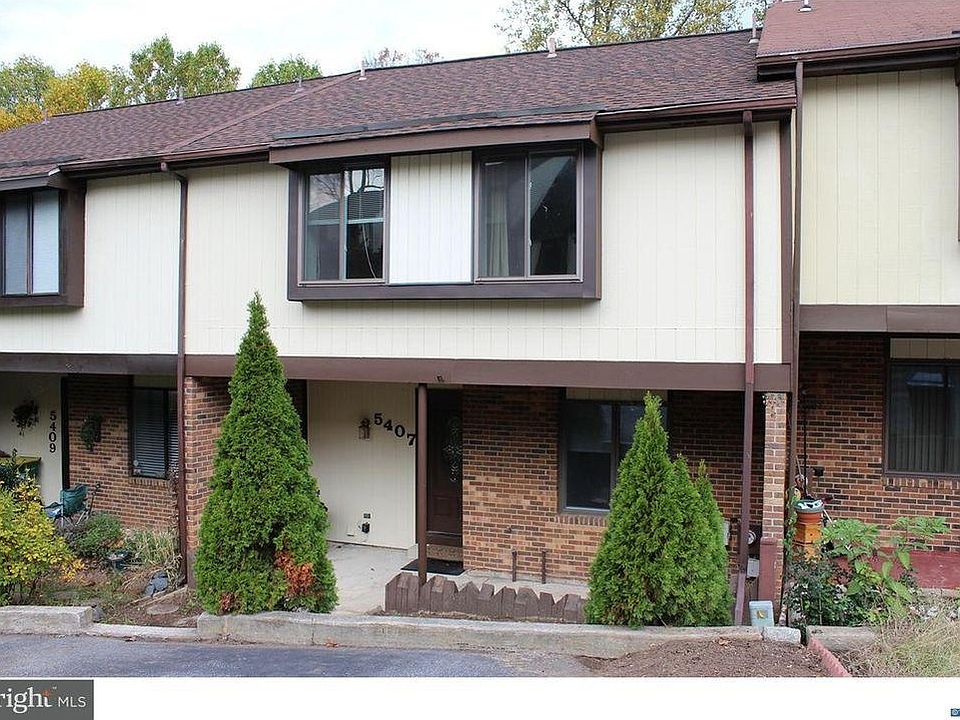 Front of Home with 2 Private Parking Spots
