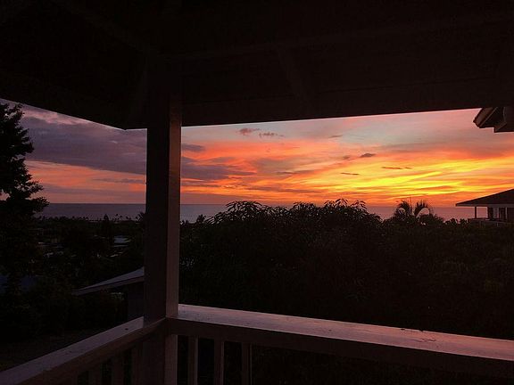 Cocktails on the bar top watching the sun sink below the horizon.