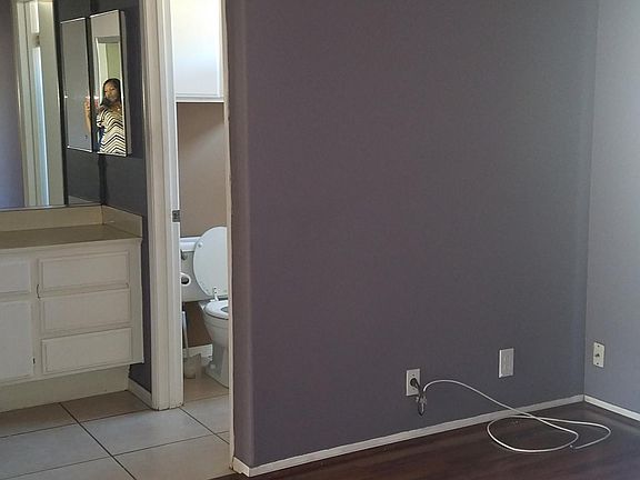 Master bedroom with full bath and vanity