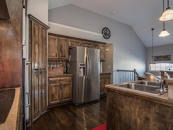 Kitchen also allows view of Entry, Dining Room and Living Room.   Beautifully crafted Raised panel Cabinetry