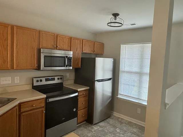 Gorgeous, updated townhome available in Whitsett! Free internet and security! — Photo 3