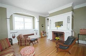 large living room with stained glas window