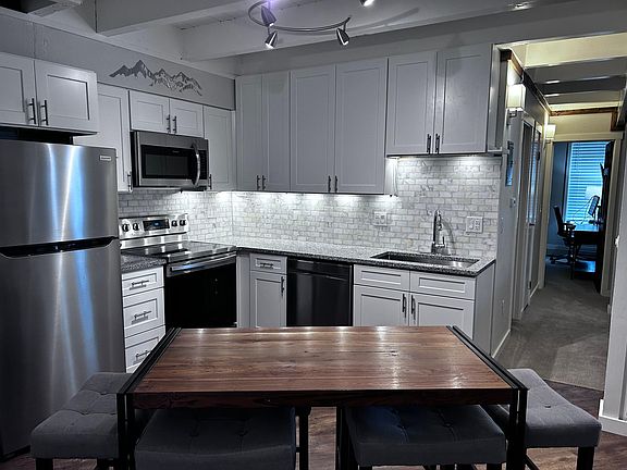 Kitchen/dining with view to bedrooms.