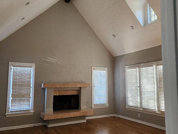 vaulted dining room, French windows, working gas or woodburning fireplace