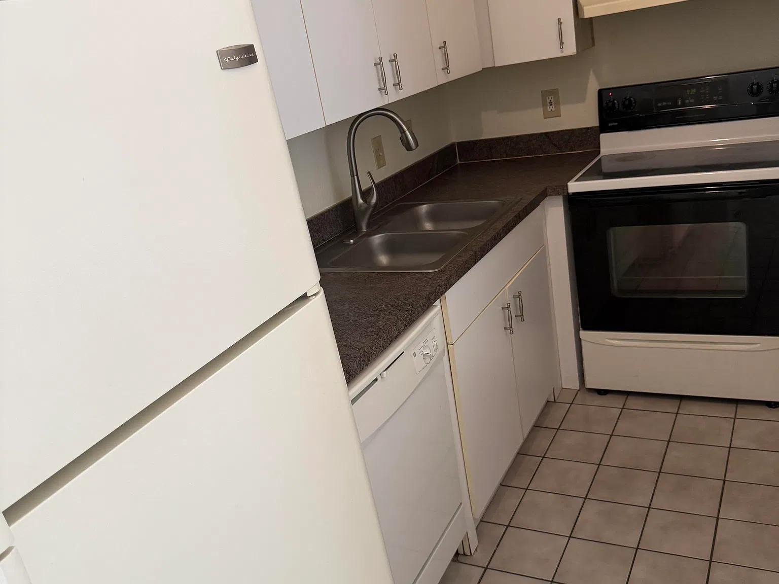 6300 Raleigh St — Photo 4