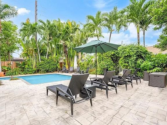 There is more tables and chairs for entertaining.