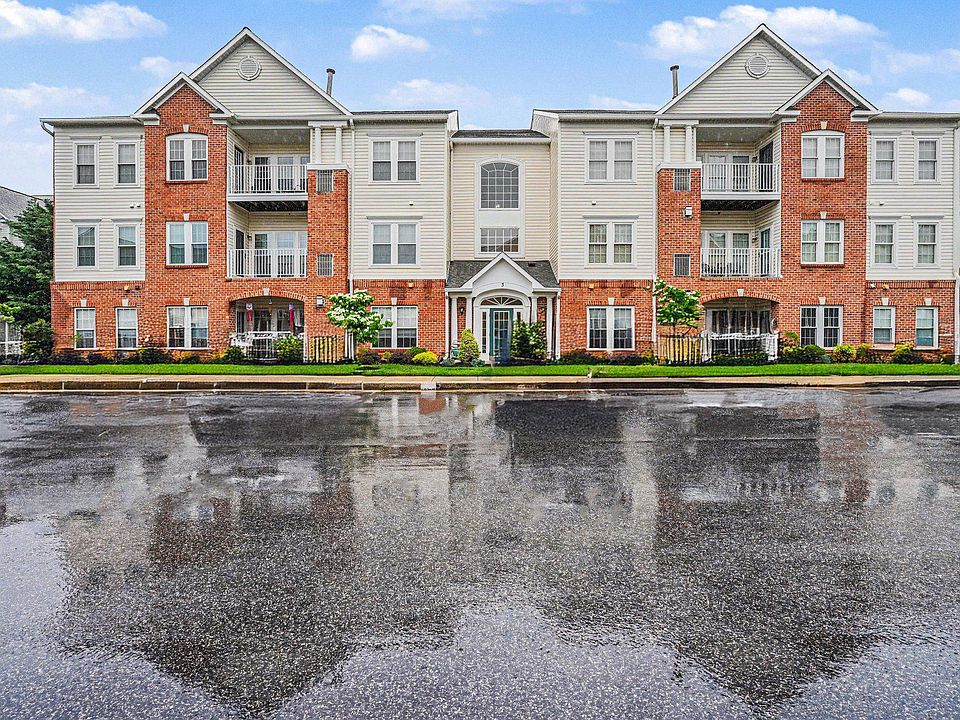 1st image of 3 Brook Farm Ct Unit 3M