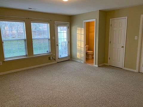 First floor bedroom with half-bath, door to back patio & backyard. Could be used as office, exercise room or bonus room/kids' play room.