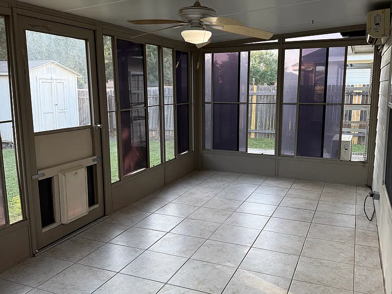 Sunroom/back porch overlooking into backyard
