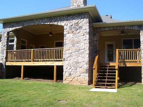 Rear Outdoor Living Area with fireplace!