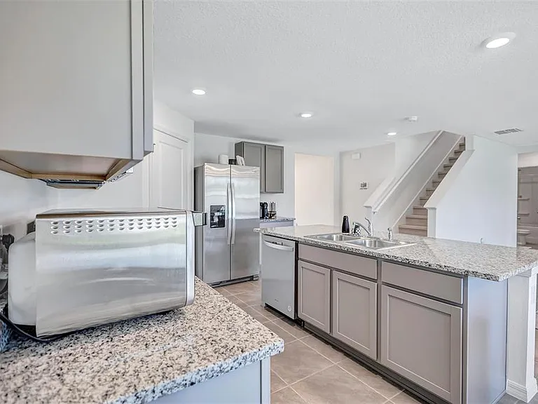 7601 Rosewood Garden Loop — Photo 11