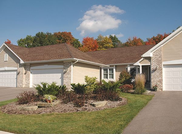 Exterior front w/ 2 stall garage