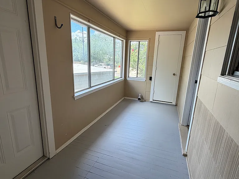 There is a room with washer and dryer connections for this apartment that is not shared
