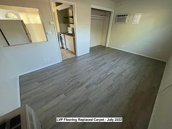 The carpet was replaced with waterproof LVP flooring in the main living area in July 2022