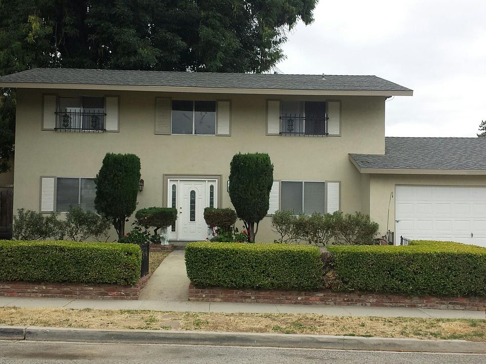 Front view of House with attached garage.